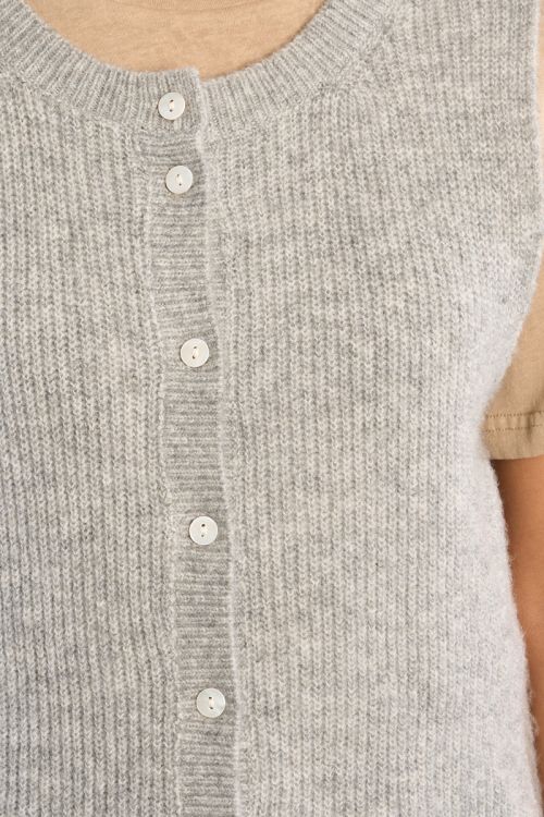 Sleeveless cardigan, buttoned