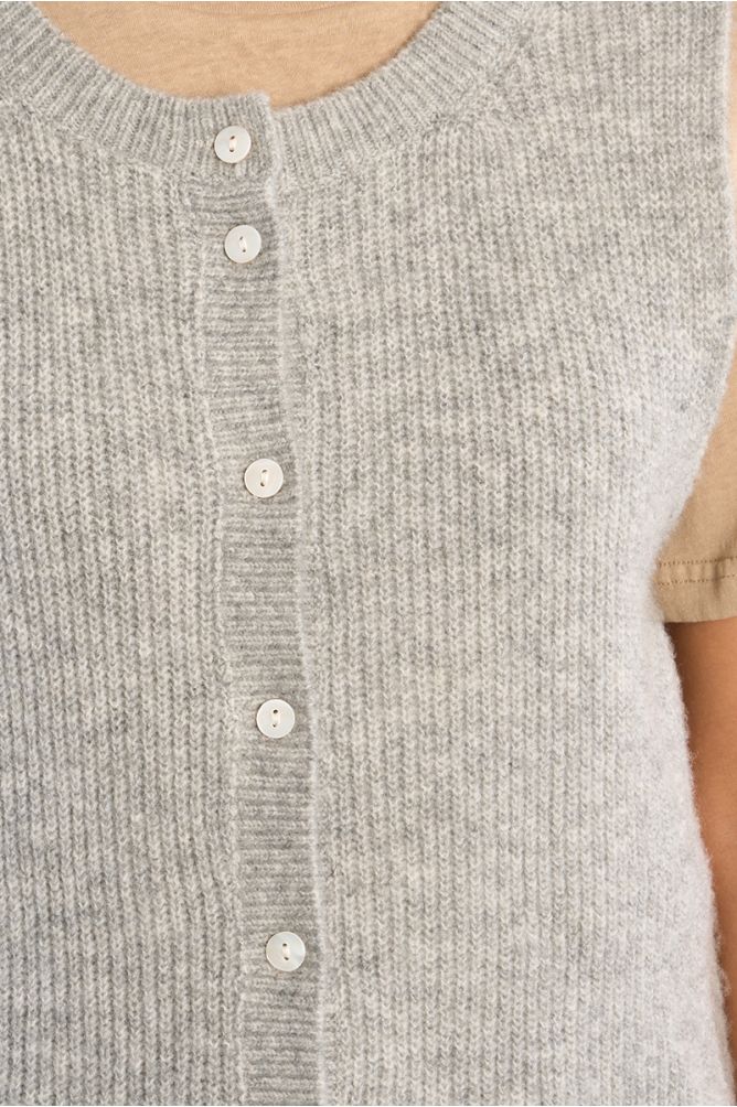 Sleeveless cardigan, buttoned