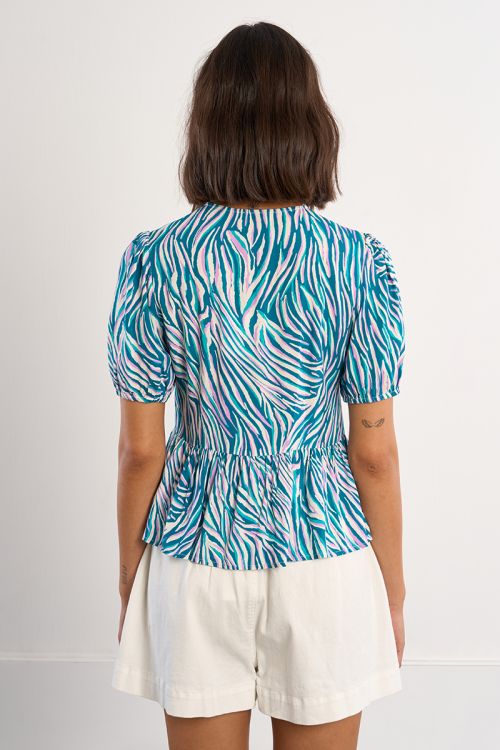 Top de mujer de manga corta, con estampado y lazada.