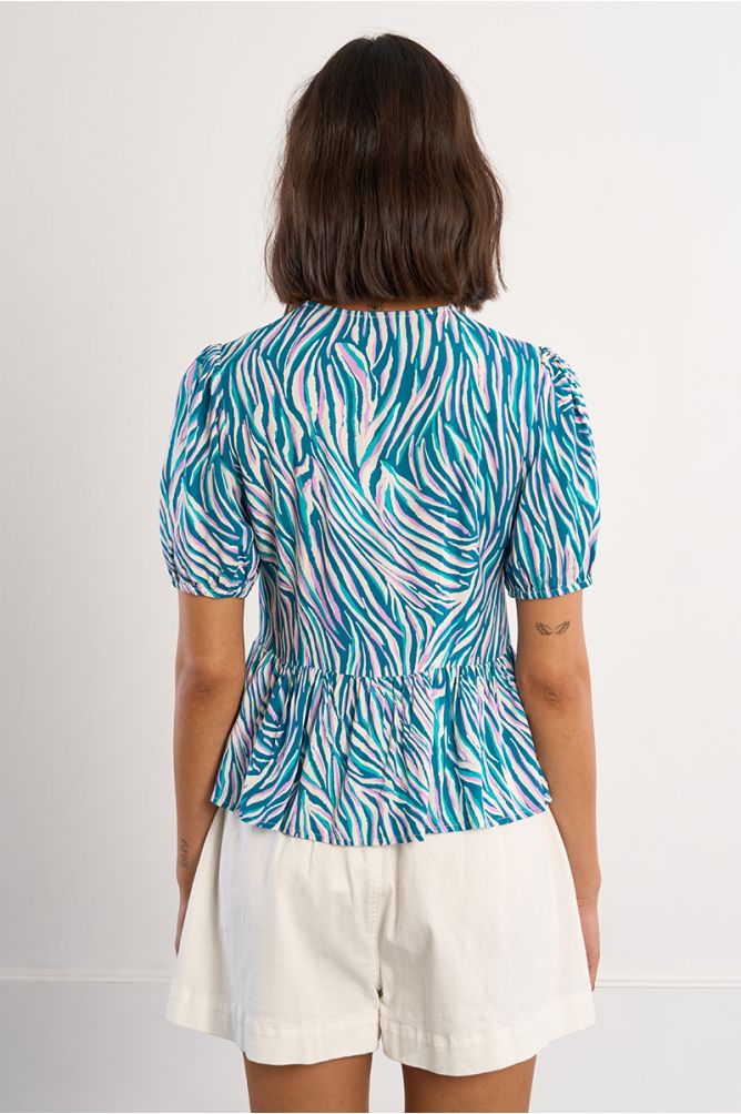 Top de mujer de manga corta, con estampado y lazada.