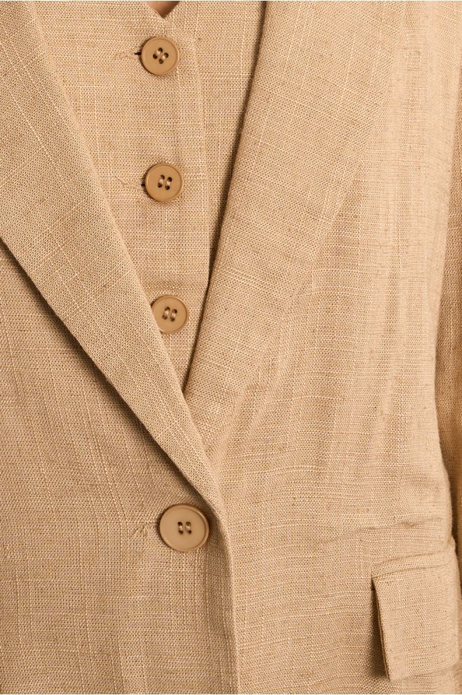 Blazer de mujer de manga larga, con cuello y solapa.