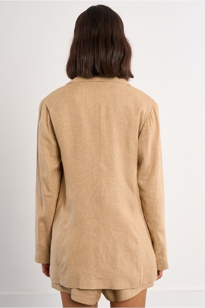 Blazer de mujer de manga larga, con cuello y solapa.