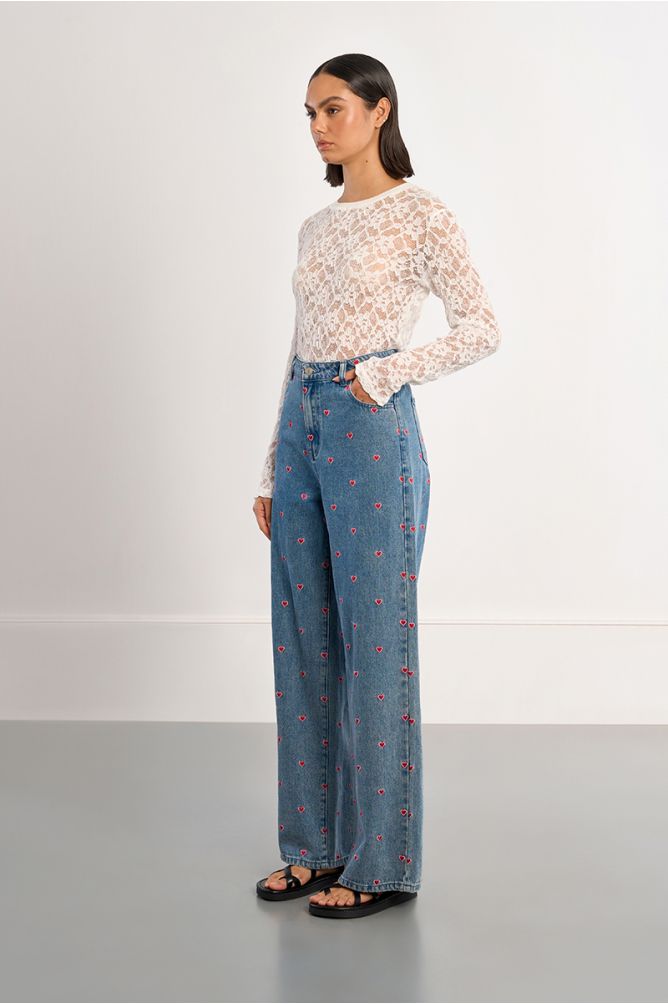 Cotton jeans with embroidered multi-hearts