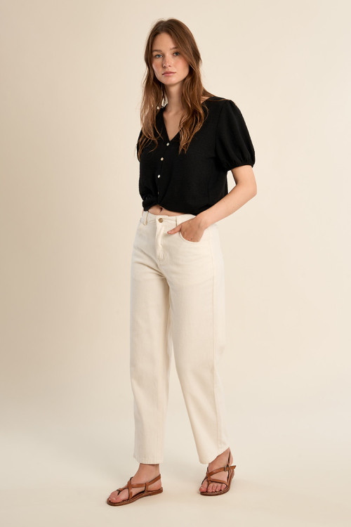 Pantalón de mujer tobillero, cinco bolsillos.