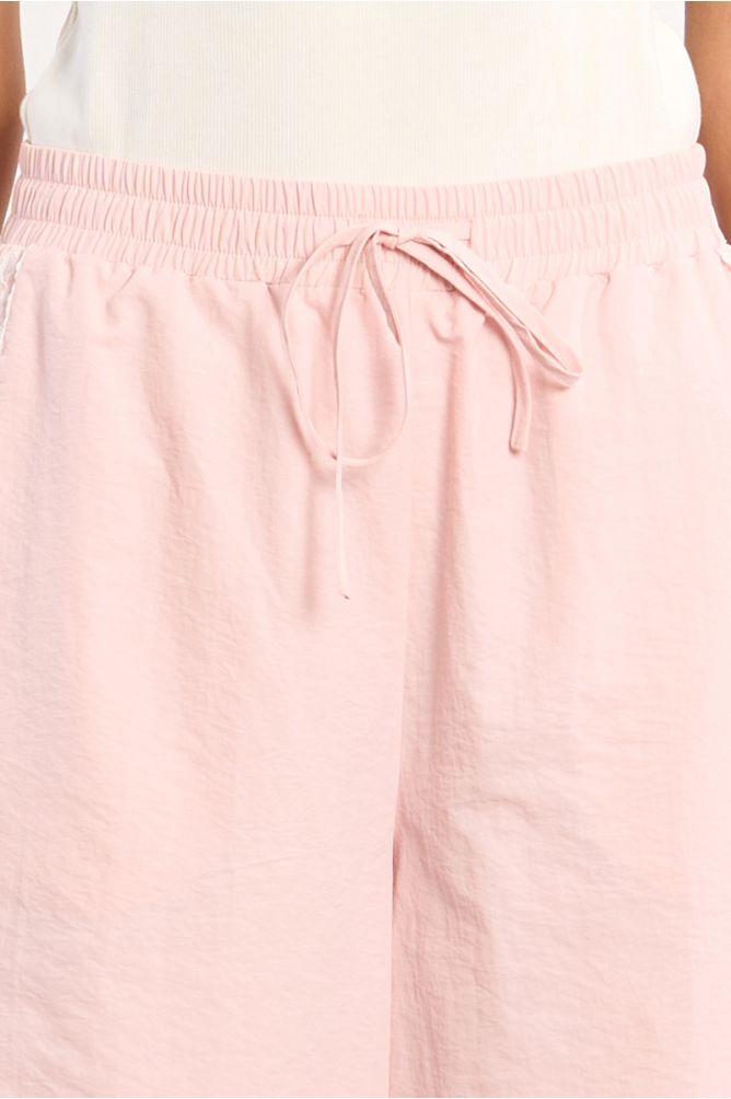 Pantalon de survêtement en nylon et en dentelle