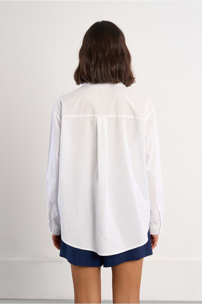 Camisa de mujer de manga larga, bolsillo frontal.