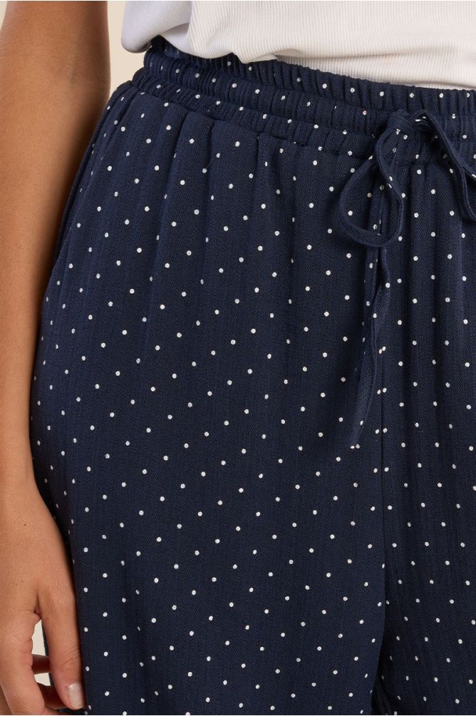 Pantalón de mujer largo, estampado lunares.