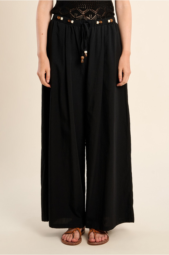 Pantalón de mujer largo, detalle abalorios.