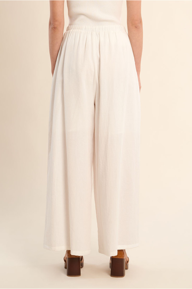 Pantalon large, cordons à perles