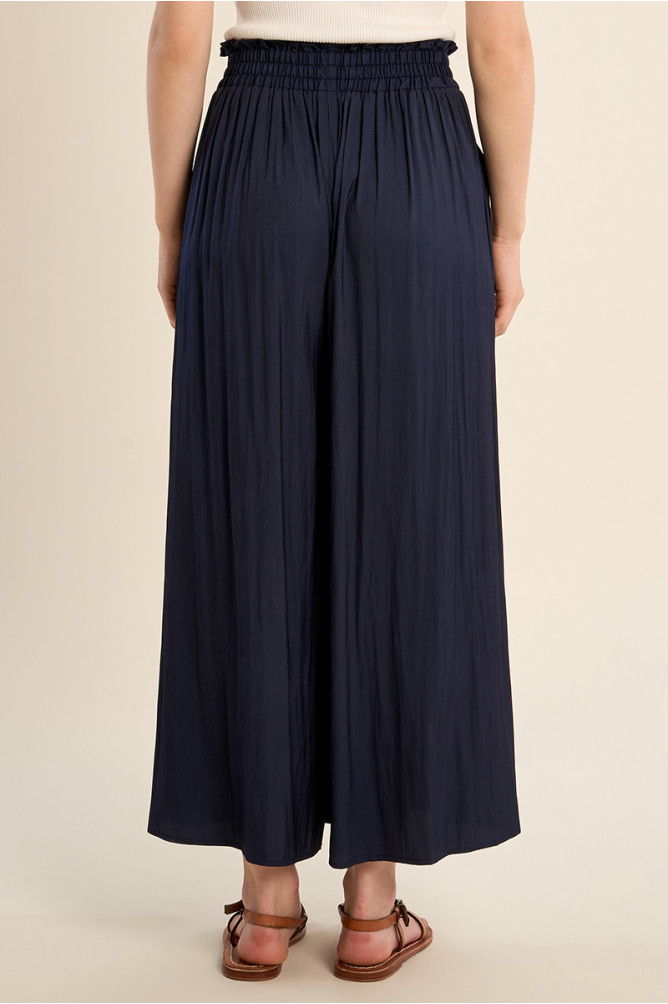 Pantalón de mujer tobillero, perneras anchas.