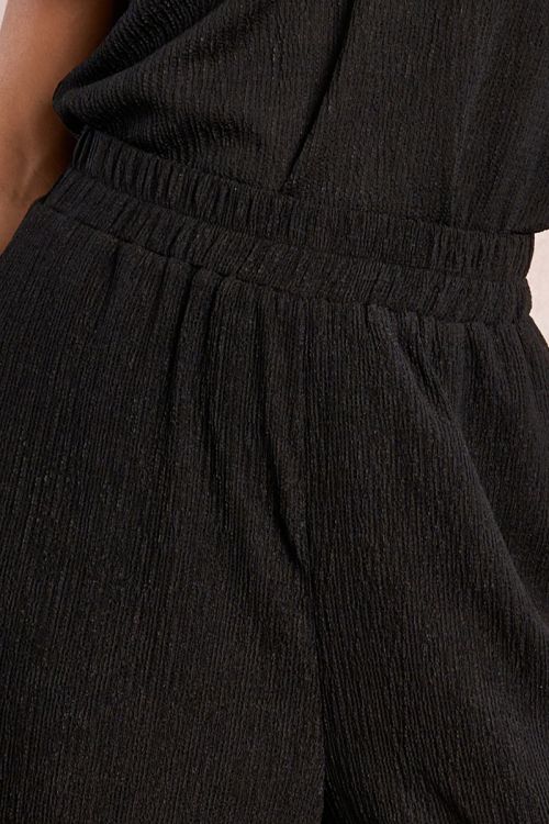 Pantalón de mujer largo, perneras rectas.