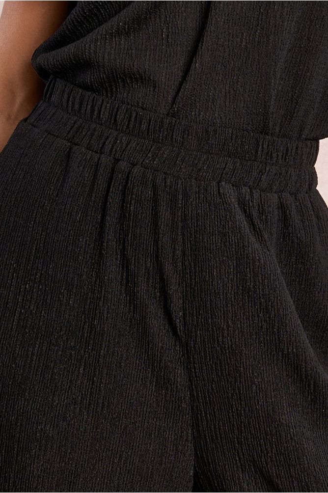 Straight, flowing trousers in semi-sheer