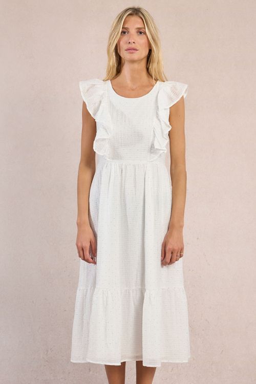 Vestido largo, de manga corta, con volantes y lunares.