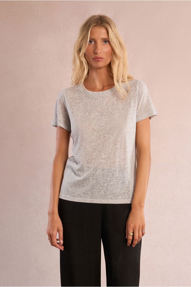 Camiseta de mujer de manga corta, tejido brillante.
