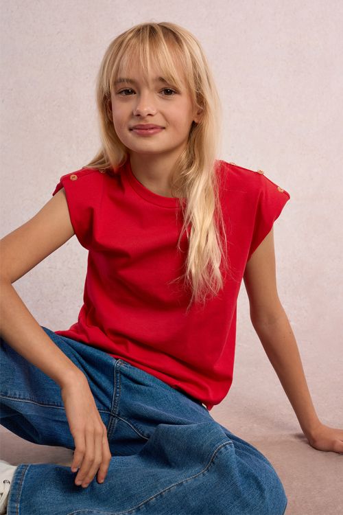Camiseta de niña de manga corta, detalle botones.