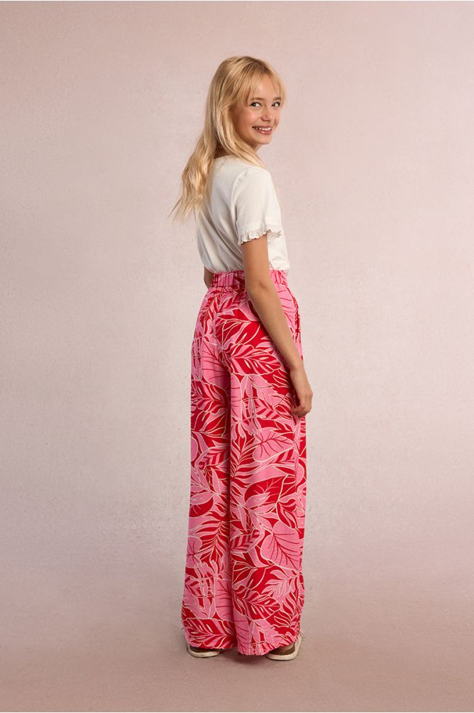Pantalón de niña largo, con pliegues y estampado.