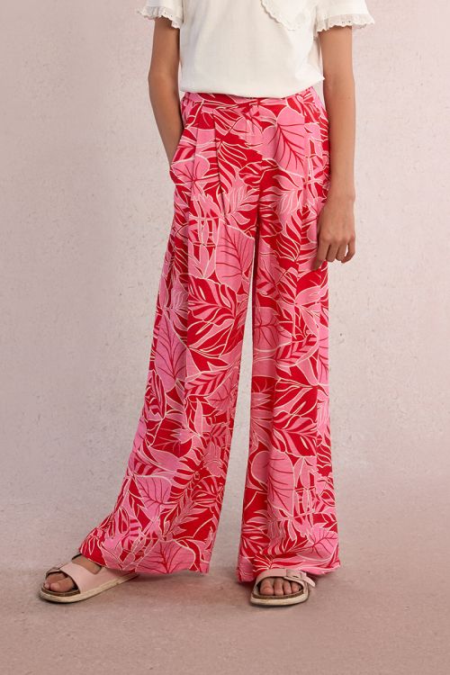 Pantalón de niña largo, con pliegues y estampado.