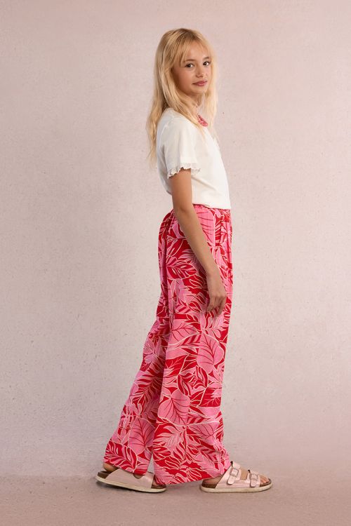 Pantalón de niña largo, con pliegues y estampado.
