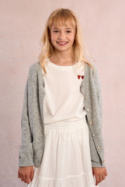 Camiseta de niña de manga corta, estampado corazones.