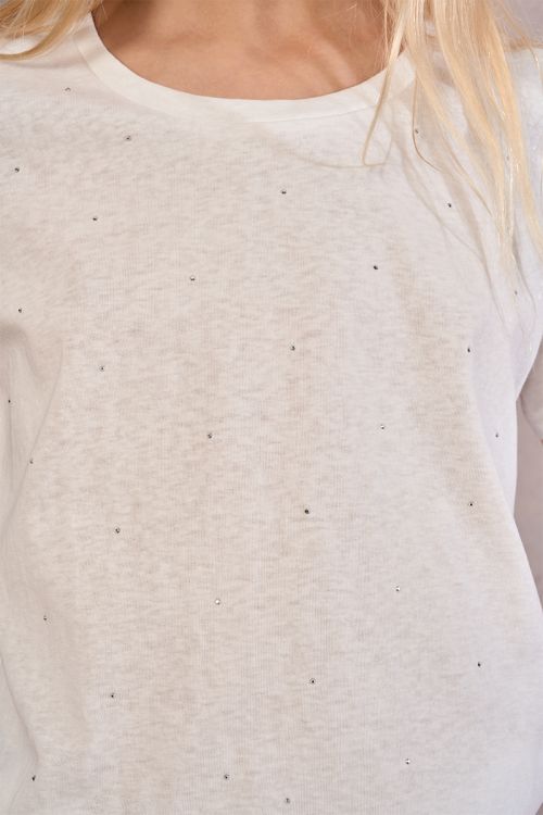 Camiseta de niña de manga corta, detalle lunares.