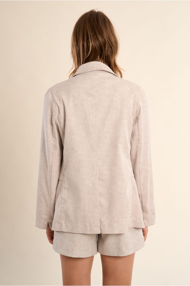 Blazer de mujer de manga larga, bolsillos frontales.