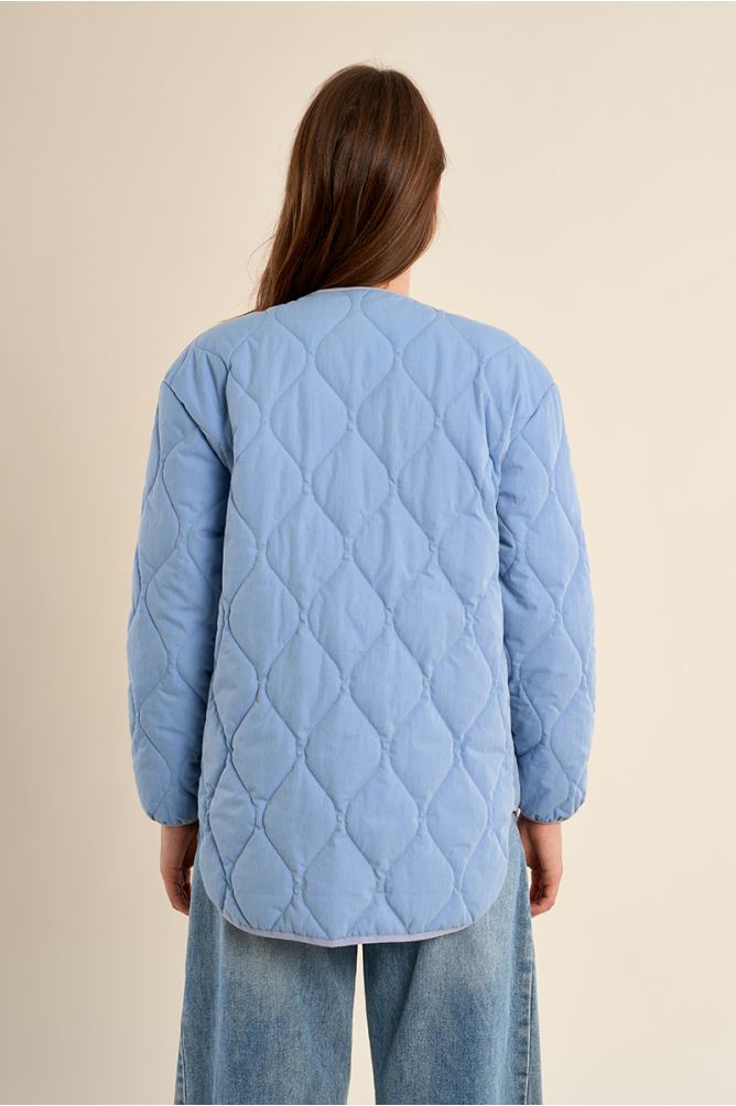 Chaqueta de mujer de manga larga, en tejido acolchado.