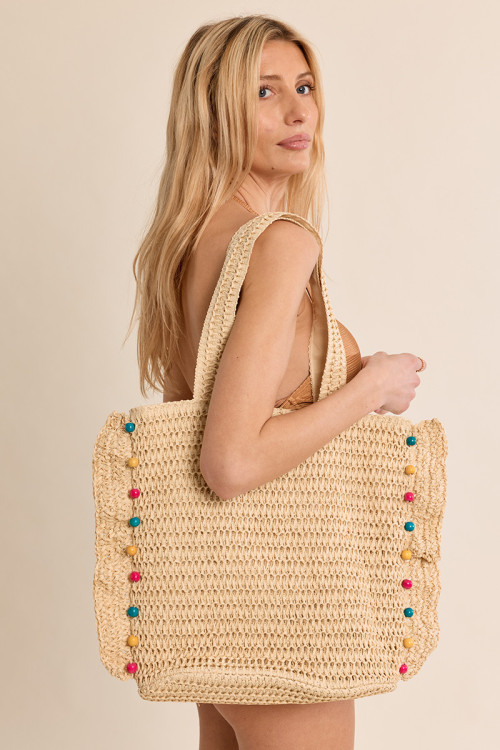 Bolso de mujer de mano, trenzado, de rafia.