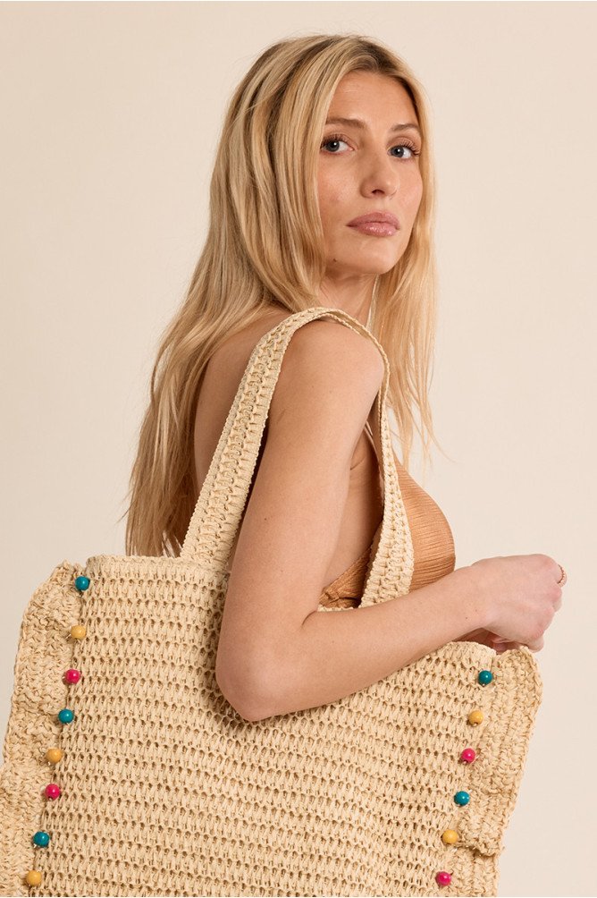 Bolso de mujer de mano, trenzado, de rafia.