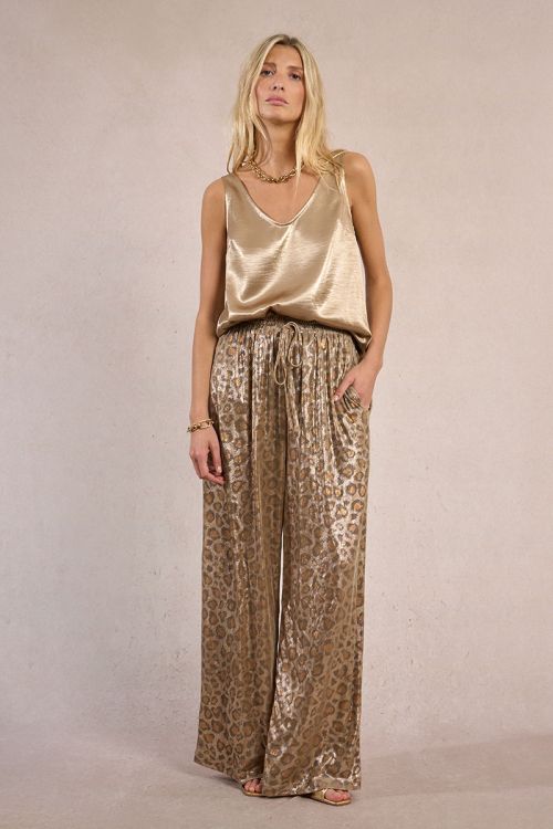 Flowing leopard print trousers, iridescent